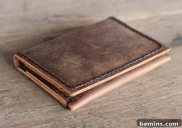 The Ultimate Gift List for Him: 12 Unique Handmade Presents 13 A light brown leather wallet with a worn look.