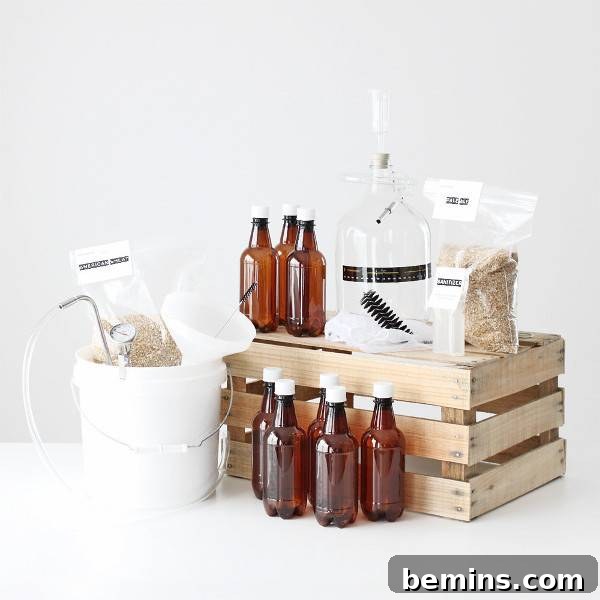 The Ultimate Gift List for Him: 12 Unique Handmade Presents 6 Amber colored bottles are arranged on the floor in front of, and on top of a wooden slatted crate.