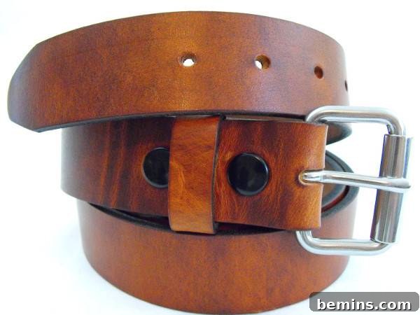 The Ultimate Gift List for Him: 12 Unique Handmade Presents 10 A rolled up brown belt with a plain silver buckle.