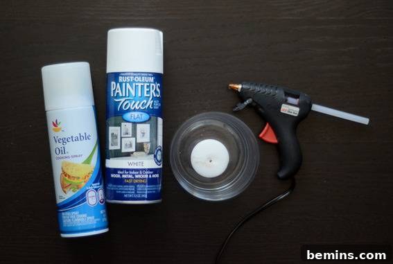 DIY Holiday Votive Candles with Hot Glue Designs 3 Materials for DIY hot glue candle holders including paint, vegetable oil, a candle and a glue gun.