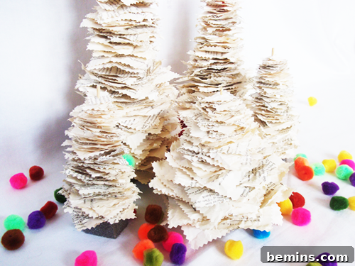 Fun and creative DIY paper Christmas tree, inspired by Anthropologie's unique and artistic designs.