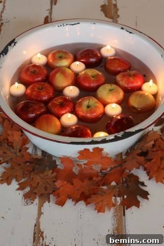 Water Filled Bowl with candle light and apples to decorate