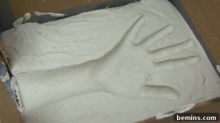 How to Craft a Realistic Replica Hand 4 A mold of a hand and wrist still in the mold caking.