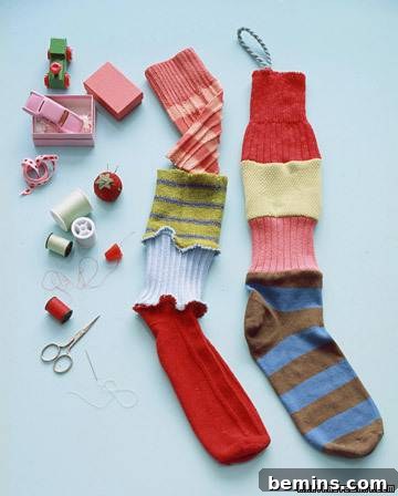 Christmas stockings creatively assembled from various fabric scraps, displayed with sewing tools, embodying a unique and resourceful DIY approach.
