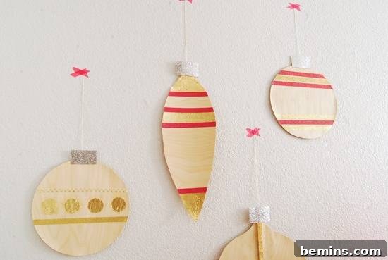 Arts and crafts ornaments taped to a wall.