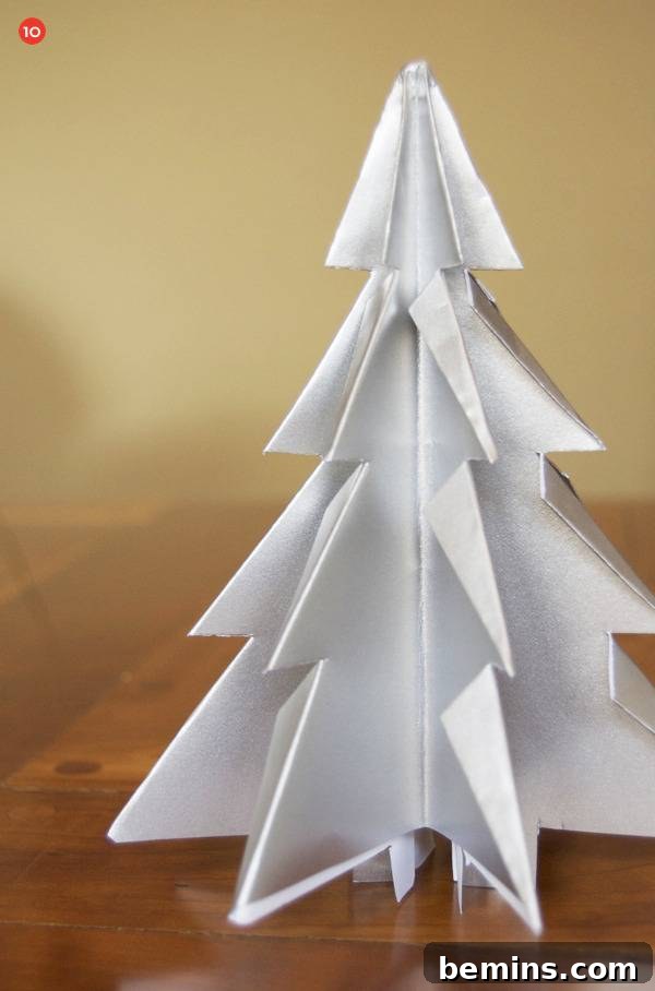 Creative Christmas: 10 Unique Tabletop Tree Alternatives 12 Christmas tree using paper on the table.