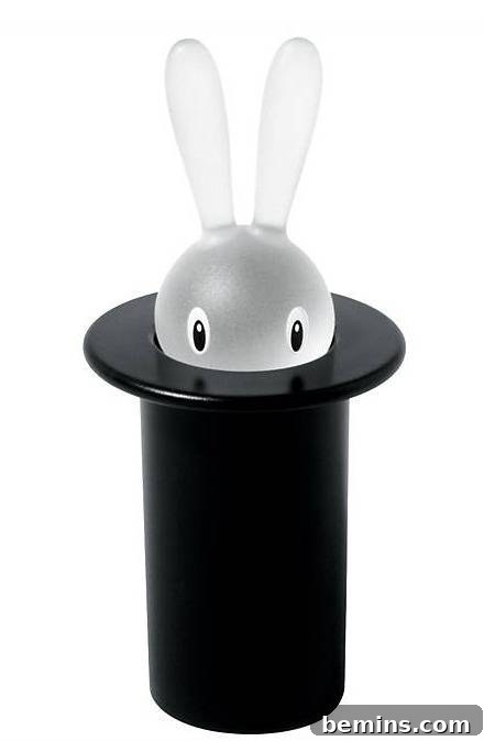 A toothpick holder shaped like a bunny coming out of a hat.