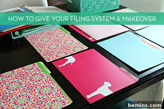 Tips for Radically Revamping Your Filing Cabinet 2 Colorful filing folders on top of a desk, illustrating an organized workspace.