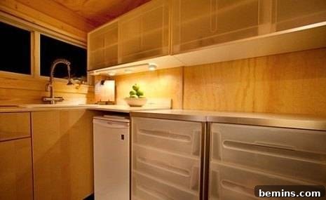 Eye Candy: 11 Tiny Homes That Will Steal Your Heart 16 Wooden kitchen platform with spotlights