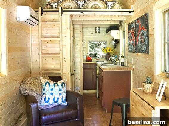 Eye Candy: 11 Tiny Homes That Will Steal Your Heart 20 Wooden tiny home interior with kitchen and couch