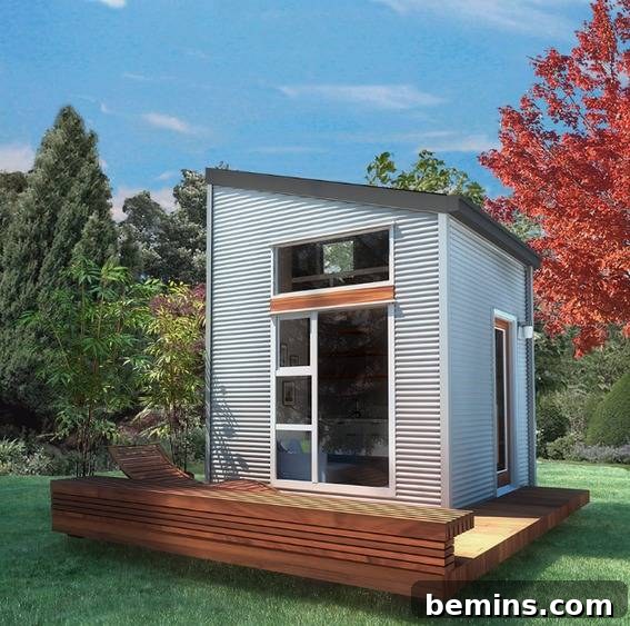 Eye Candy: 11 Tiny Homes That Will Steal Your Heart 23 Tiny home with deck near a grove of trees