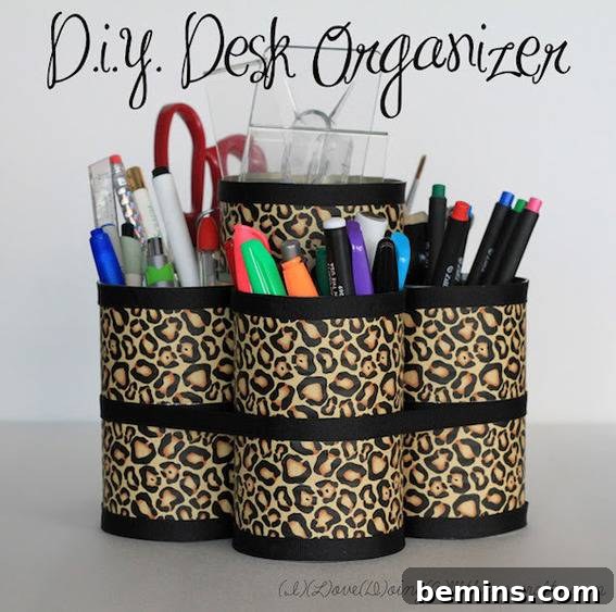 7 Creative DIY Desktop Organizer Ideas 4 Pen holder filled with pens and scissor.