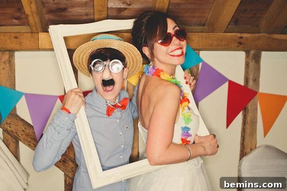 A couple pose in festive costume in a fake photo frame.