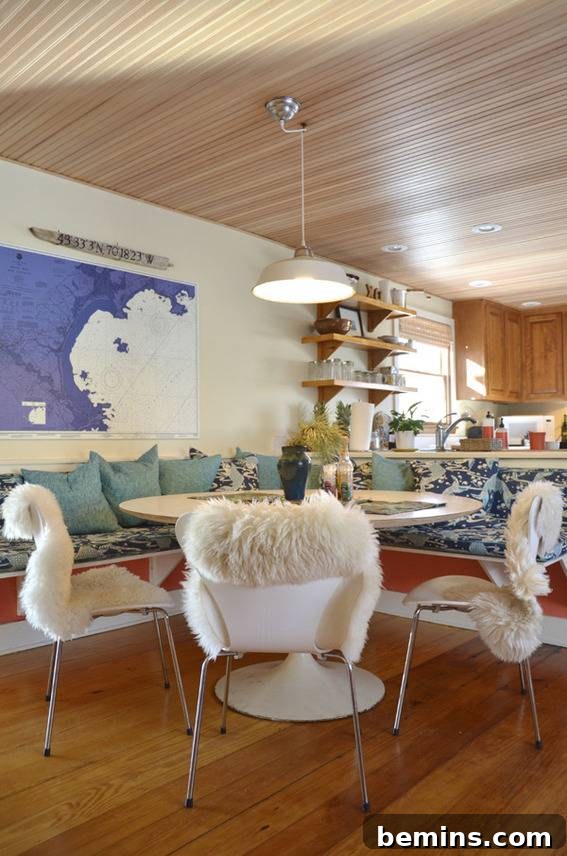 The dining room in the renovated coastal cottage, showcasing an inviting space for family meals and gatherings.