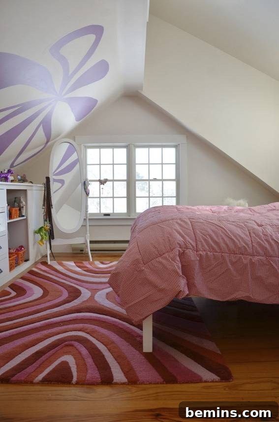 The daughter's bedroom in the renovated coastal cottage, featuring a charming and personalized design.
