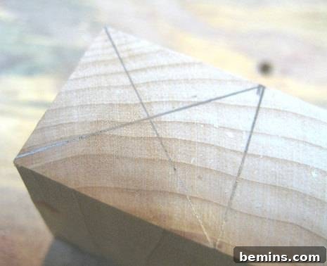 Close-up of a wooden block with a drilled hole for a test tube