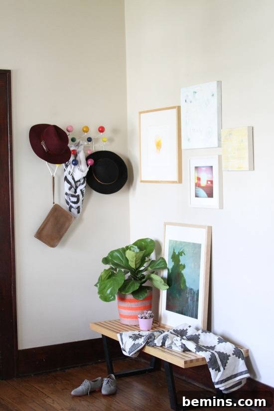 "Living room with photo frames and decorative items."