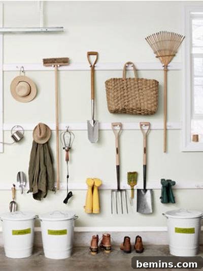 Clever Garage Clean-Up: 10 Straightening Strategies 11 Garage wall of hooks for storage