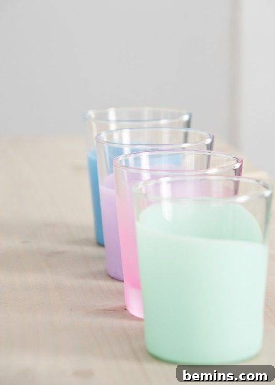 Beaker with colorful liquids for a creative project.