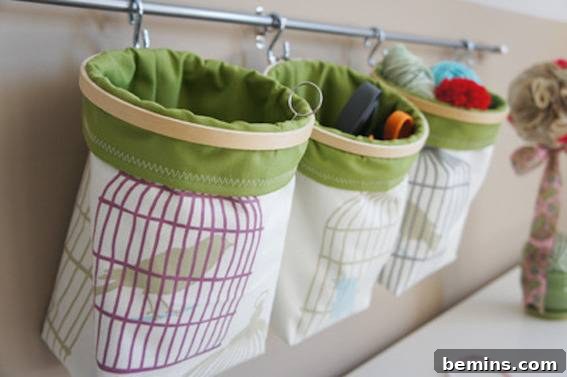 Embroidery hoop storage bins hanging on the wall