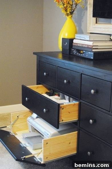 Dresser drawer converted into a hideaway printer space