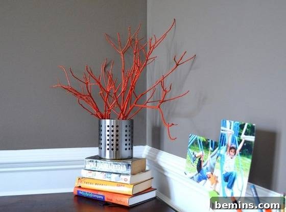 Painted twigs in a vase.