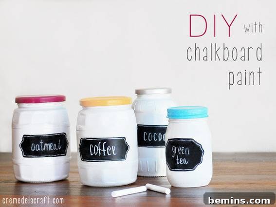 Mason jars painted whife, and labeled with various names for kitchen items.