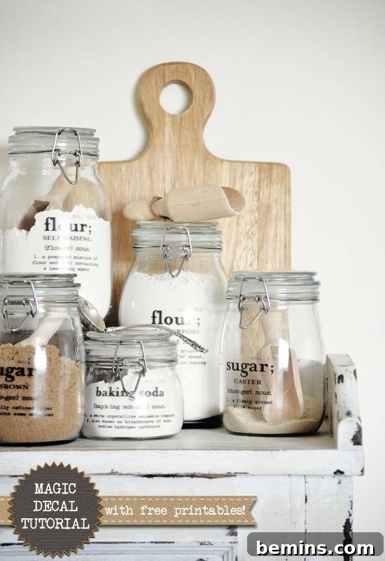 Several spices & sugars are in glass jars.
