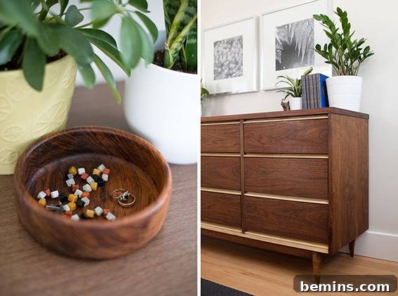 Scandinavian Sanctuary: Bedroom and Bath Transformation 12 A brown dresser against a grey wall, showcasing the room's color palette.