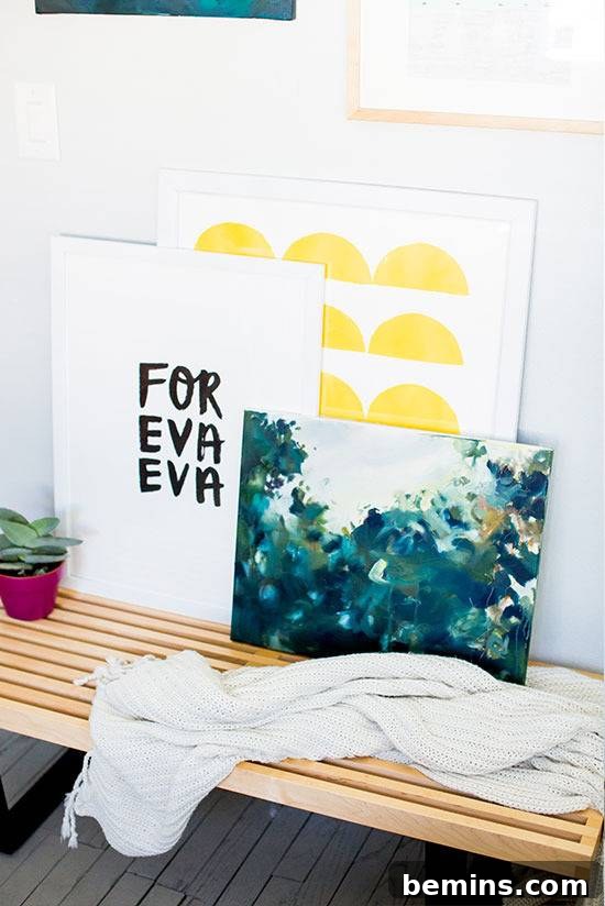 Budget-Friendly Big Art: Creating Large Artworks for Under $10 8 A wooden table with pictures and a cloth