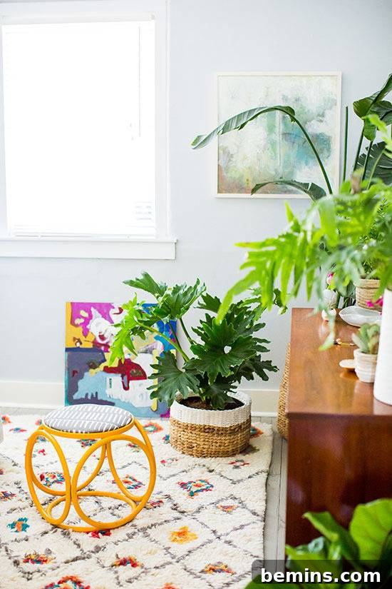 "Living room with plants and table."