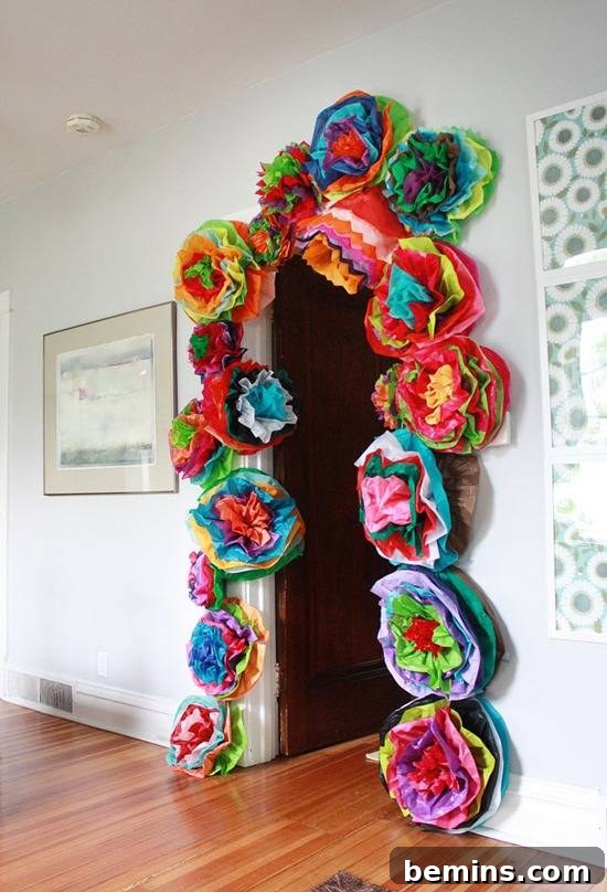 DIY giant fiesta flowers made from tissue paper, perfect for Cinco de Mayo entry decor.