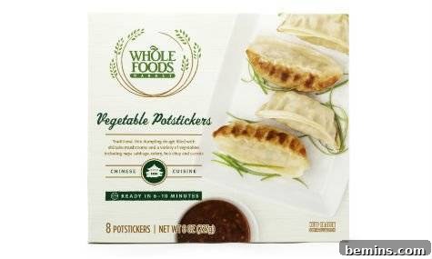 A box of Whole Foods Market Pork and Vegetable Potstickers, highlighting the fresh ingredients and authentic Asian flavors