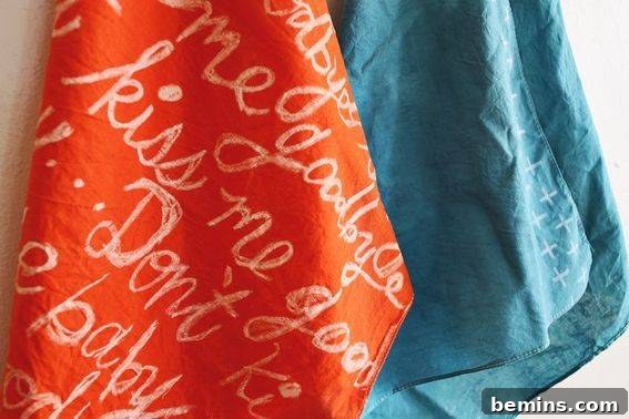 14 Textile DIYs to Level Up Your Craft Game 16 An orange cloth hanging next to a blue cloth, displaying contrasting colors and textures.