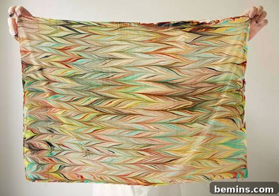 14 Textile DIYs to Level Up Your Craft Game 8 A modern cloth displaying a vibrant floral and colorful design, showcasing a contemporary aesthetic.
