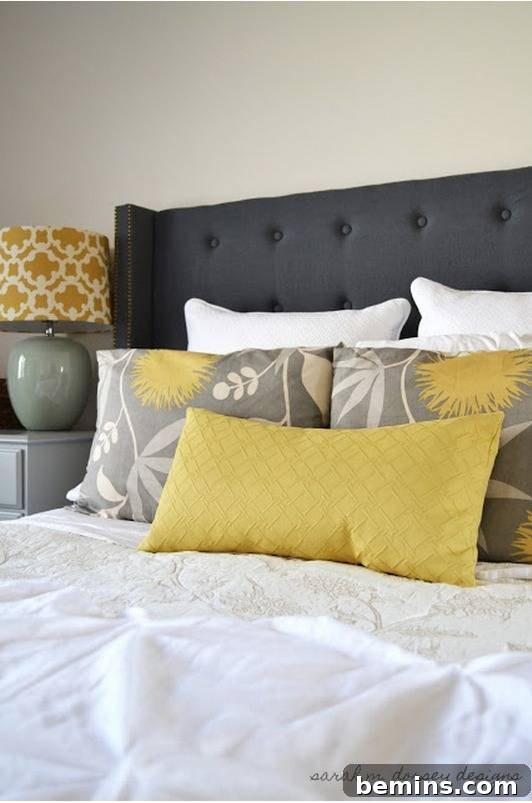 Large bed with multiple pillows and headboard