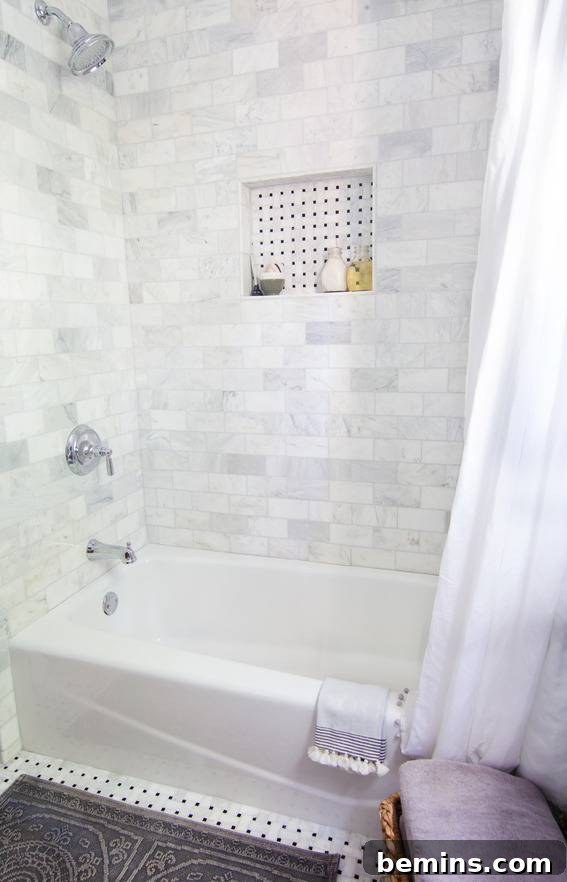 Marble Shower with Chrome Fixtures