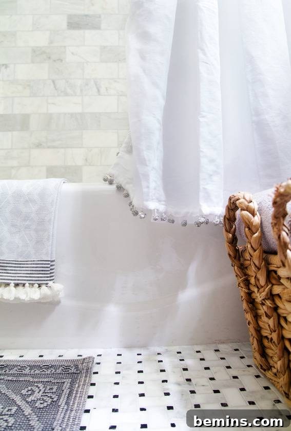 Marble Subway Tile Shower, Marble Basket Weave Floor, & Kohler Tub