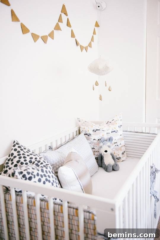 From Office to Oasis: A Geometric Nursery Transformation 9 Geometric Nursery Crib Area