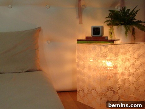 A bright room with acrylic bedside table lamp