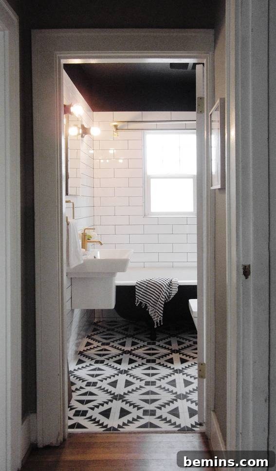 Dark and Dramatic: A Bathroom Transformation That Embraces Bold Patterns and a Luxurious Aesthetic