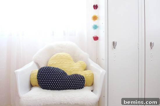 DIY cloud pillows made from old sweaters, a creative and eco-friendly way to recycle old clothing into cozy decor.