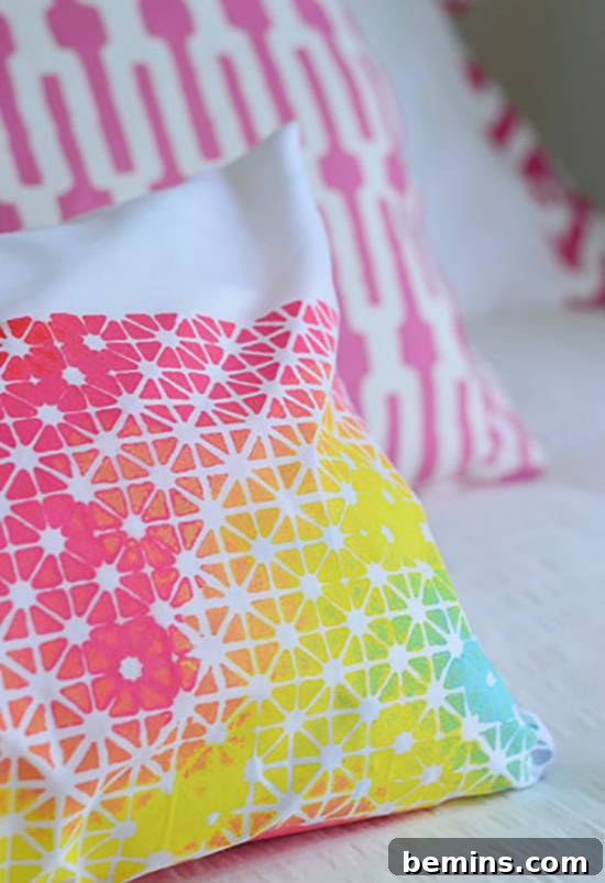 DIY painted pillow using a metal grate for a unique textured design.