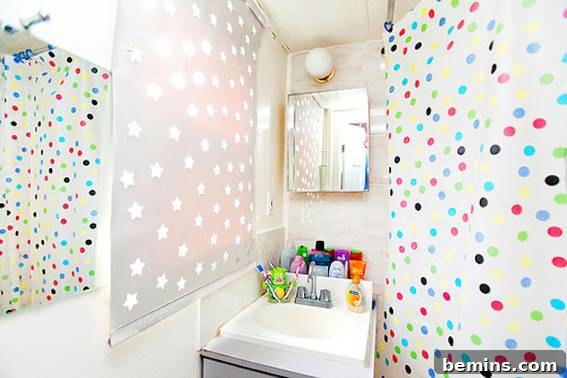 This busy bathroom features both a display of white stars and colorful polka dots that seem to match the bottles around the sink area.