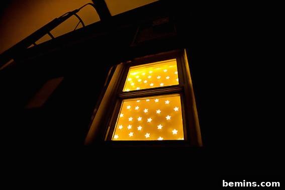 A window shows a yellow light with stars on it.