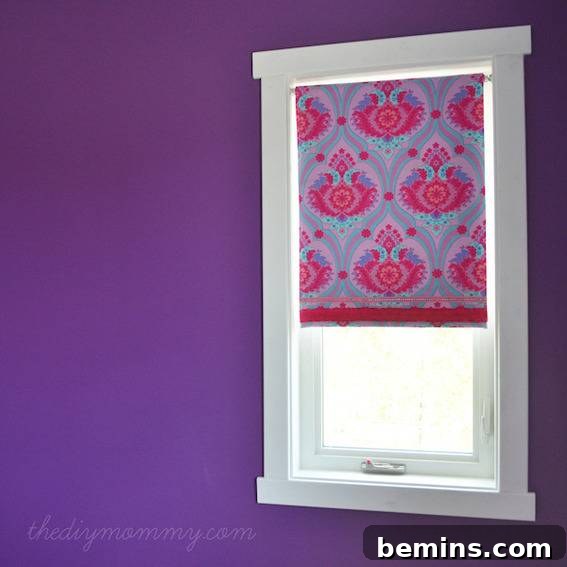 A roller shades open in window