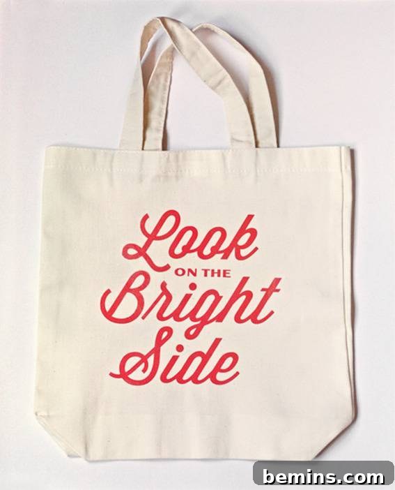 Ten Trendy DIY Tote Bags to Rock This Summer 3 DIY tote bag with inspiring quotes ironed on, a personalized and stylish accessory.