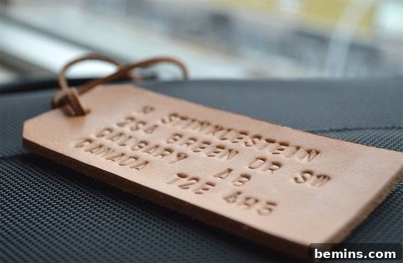 A leather stamped suitcase tag, a personalized and practical gift for the traveling dad.