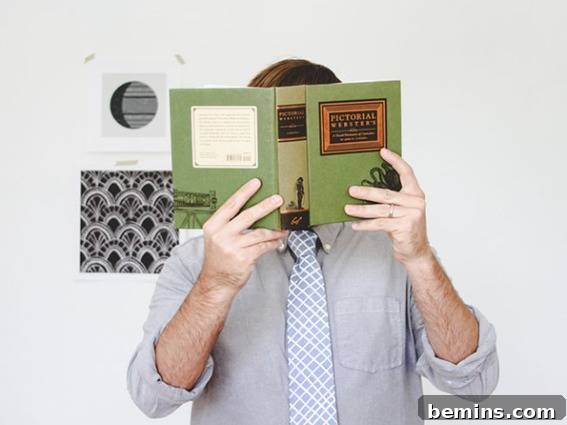 Man with green book