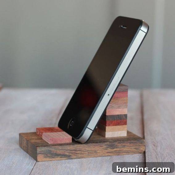 A handcrafted wooden cell phone stand, a practical and stylish gift.